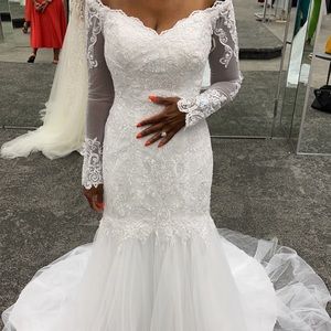 Wedding Dress, usually a 4 but had to get an 8 for her breast. Not altered yet